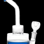 Clear glass water pipe (bong) with blue accents and a glass bowl.