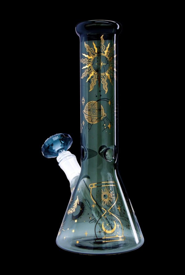 Green glass bong with gold celestial designs.