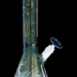 Green glass bong with gold celestial and desert-themed illustrations.