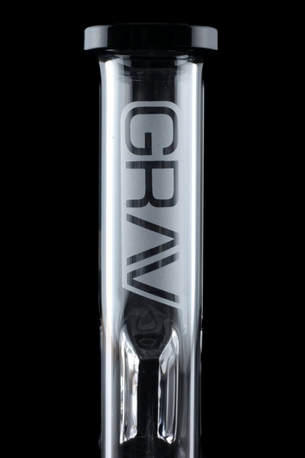 Clear glass water pipe with “GRAV” vertically printed along its length, against a black background.