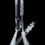 Clear glass bong with ice catch and branded lettering, isolated on black.