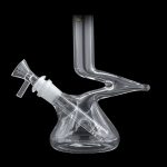 Clear glass water pipe with intricate design.