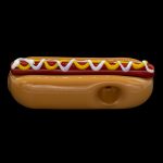 Glass pipe shaped like a hot dog with mustard and ketchup.