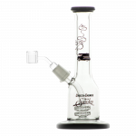The Cheech & Chong "Jade East" Mini Rig Dabber is shown in a studio shot, with its clear glass body and compact size highlighted.