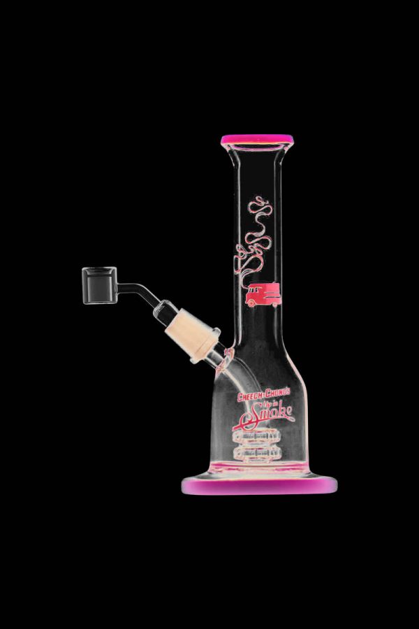 A studio shot of the Cheech & Chong "Jade East" Mini Rig Dabber, displaying its compact size and glass construction.