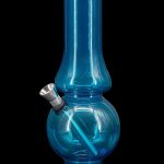 Blue glass water pipe, also known as a bong, with a metal bowl.