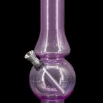 Purple glass water pipe (bong) with a metal bowl and downstem, isolated on a black background.