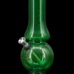 Green glass water pipe (bong) with a flared base and clear glass downstem.