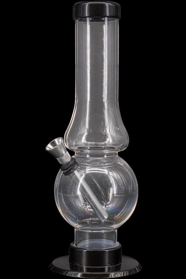 Clear glass water pipe (bong) with a downstem and base, isolated on a black background.