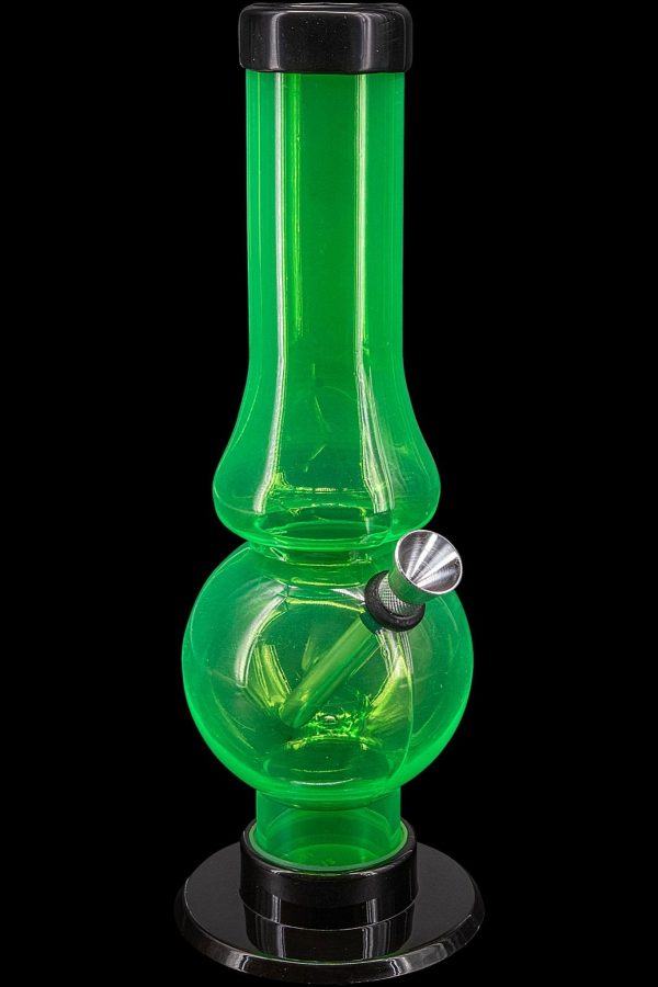 Green glass water pipe with a black base and bowl.