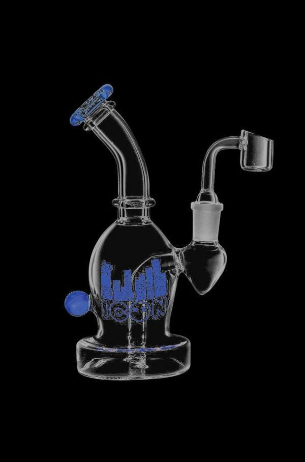 Front view of the Diamond Glass Icon Ori Dab Rig, featuring a clear glass body and a curved neck with a matching glass joint.