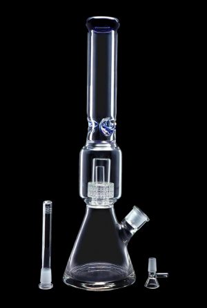 Clear glass bong with ice catcher and diffuser downstem, accompanied by a separate glass bowl and downstem, against a black background.