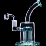 Light blue glass rig with multiple diffusion stems and a quartz banger.