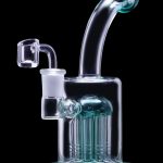 Blue glass dab rig with multiple perc diffusion for water filtration.