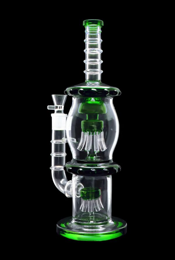 A vibrant green and clear glass water pipe (bong) with a complex multi-chamber percolator design.