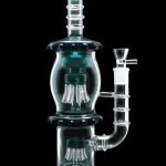 A studio shot of the 13.5-inch Smoke Cartel Straight Tube with Dual Octopus Perc, highlighting its clear glass construction and intricate perc design.