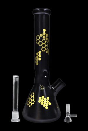 Black glass bong with gold honeycomb pattern, accompanied by a downstem and bowl.