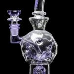 Clear glass water pipe (bong) with purple accents and intricate bubble design.