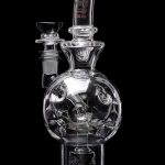 Clear glass water pipe (bong) with intricate bubble design.