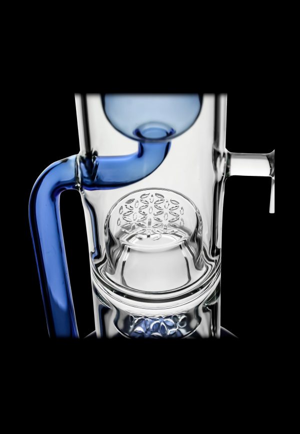 Blue and clear glass dab rig with intricate honeycomb perc diffusion.