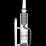 Clear glass water pipe (rig) with multiple chambers and percolators, isolated on a black background.