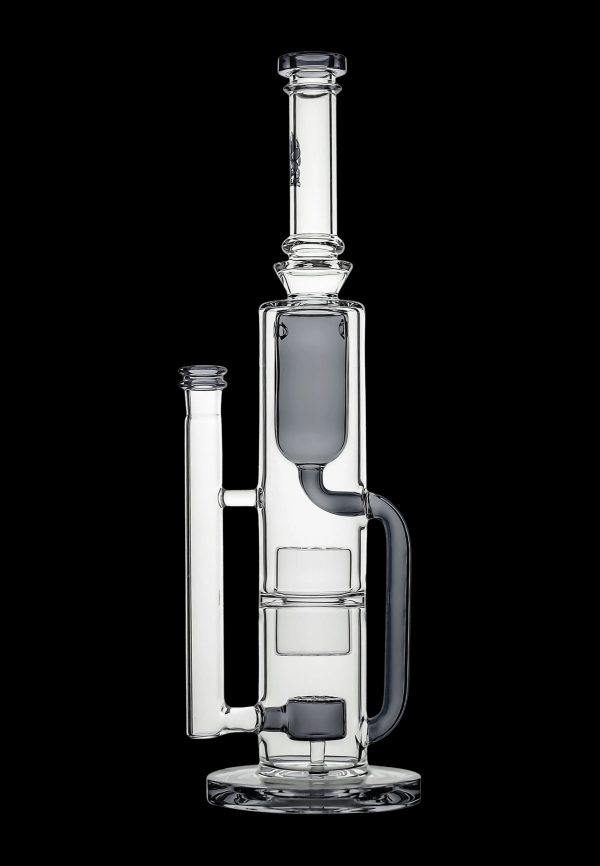Clear glass water pipe (rig) with multiple chambers and percolators, isolated on a black background.