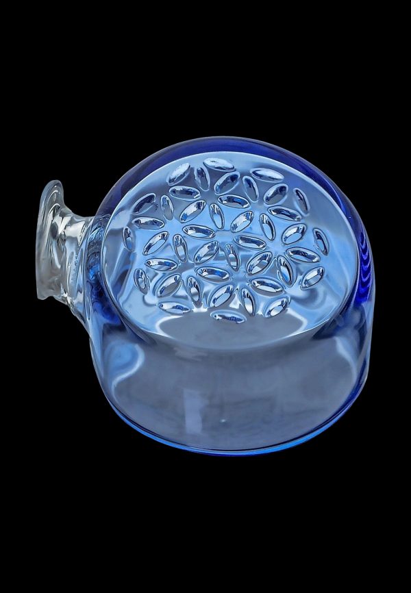 Blue glass bubbler with intricate honeycomb perc diffusion.