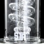 Front view of the GRAV® STAX Flare Base with Coil Showerhead Perc, showcasing its clear glass construction and coiled perc design.