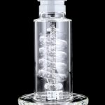 Front view of the GRAV® STAX Flare Base with Coil Showerhead Perc, showing its clear glass construction and unique coil perc design.