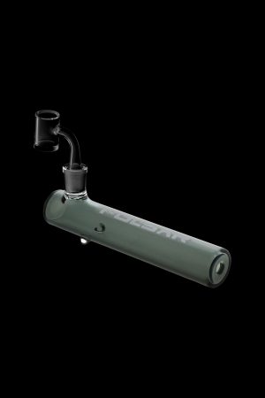 Green glass oil rig with a bent neck and domeless nail, isolated on a black background.