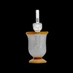 Elegant glass bubbler with orange accents and a clear mouthpiece, isolated on a black background.