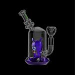 Purple glass water pipe with an alien-shaped perc inside, against a black background.