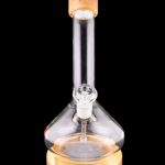 Glass water pipe with wooden accents, isolated on black.