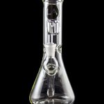 Clear glass water pipe (bong) with ice catch and brand logo, studio shot.