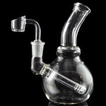 A front view of the LA Pipes Mini Bubble Base Concentrate Rig, showcasing its clear glass construction and rounded base.
