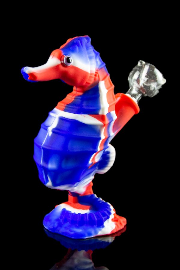 Front view of the Premium Silicone Seahorse Molded Water Pipe, showcasing its sculpted, ocean-blue design against a black background.