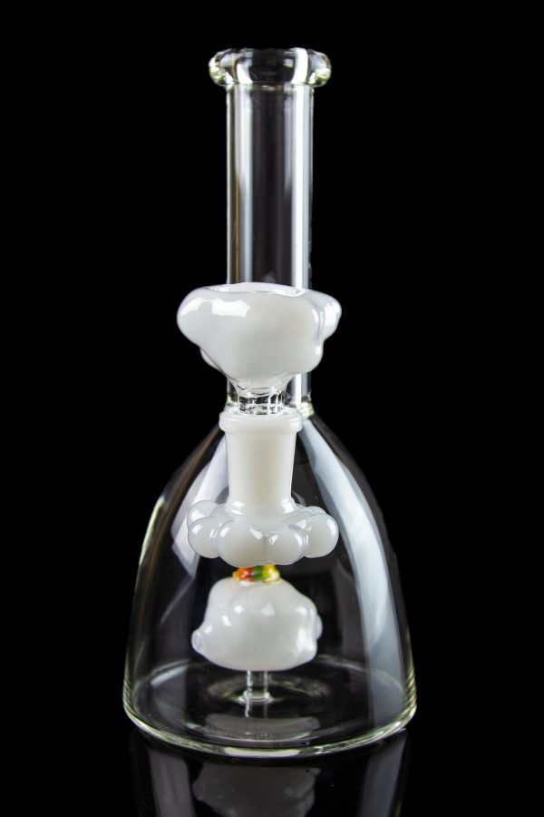 Glass bubbler water pipe with white percolator chambers against a black background.