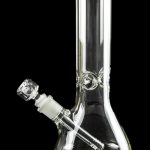 Clear glass bong with ice catcher and downstem, isolated on black.