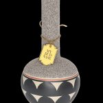Hand-thrown ceramic bud vase with Southwestern-inspired geometric patterns and a tag reading “My Bud Vase.”