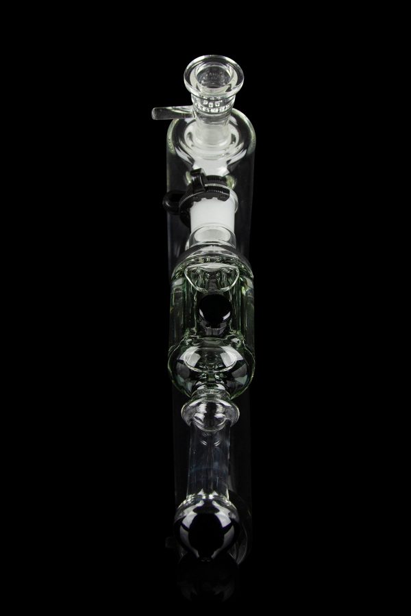 Clear glass bubbler water pipe against a black background.