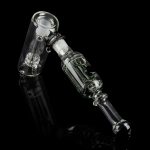 Clear glass oil rig with percolator, isolated on black.