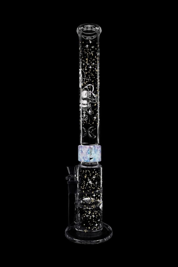A glass bong with a black and white celestial design, featuring stars and crescent moons, against a black background.