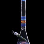 A colorful glass bong with intricate designs, isolated on a black background.