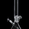 Clear glass bong with ice catcher, isolated on black.