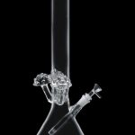Clear glass bong with percolator against a black background.