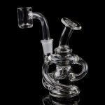 Clear glass dab rig with intricate looping design, against a black background.