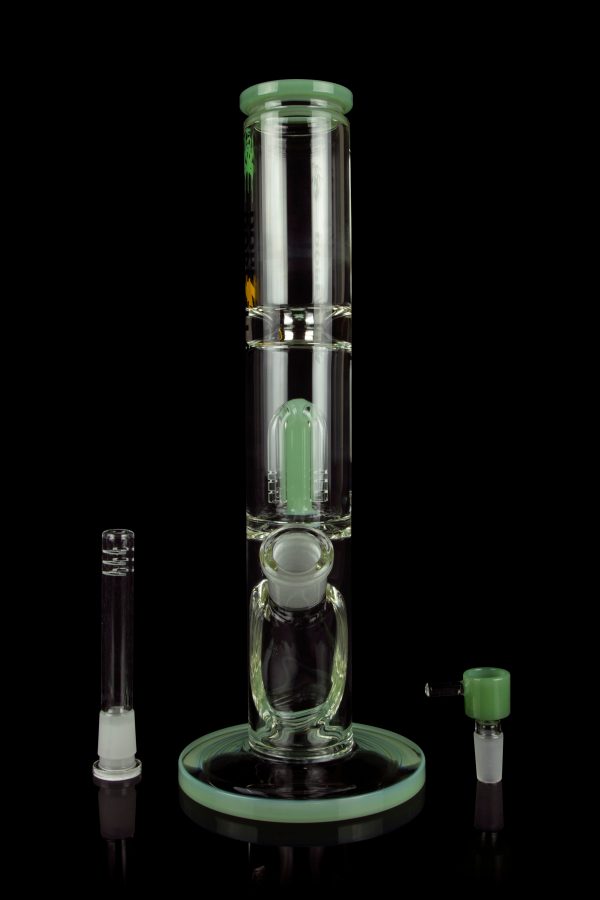 Green glass bubbler water pipe with detachable downstem and mouthpiece, reflecting on a dark surface.