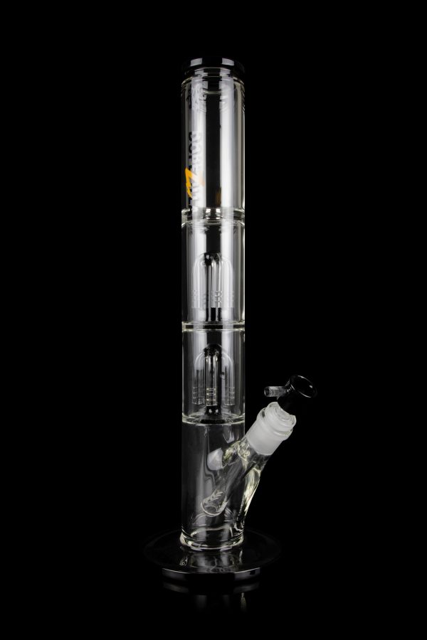 Clear glass bong with multiple percolators, isolated on a black background.