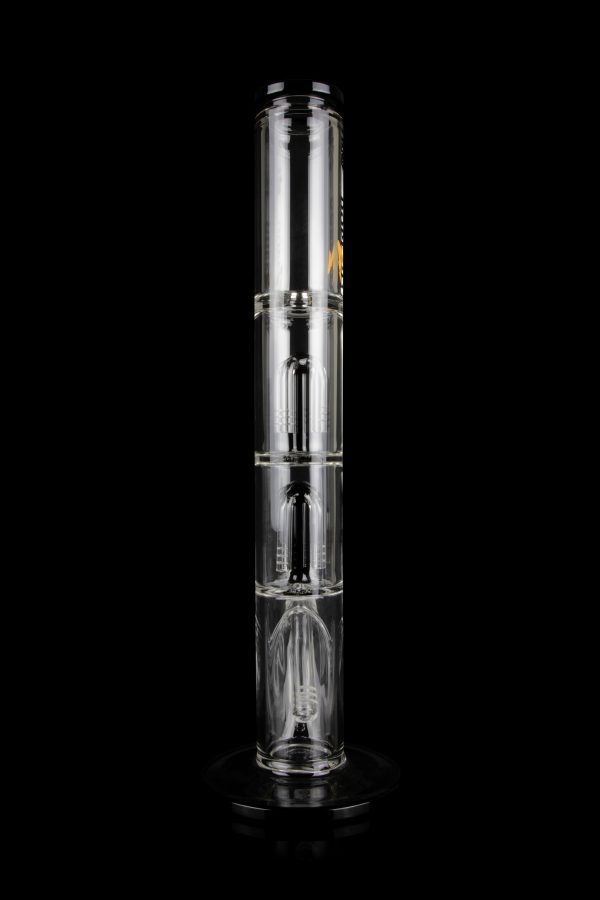 Clear glass bong with multiple chambers and percolators, isolated on a black background.