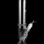 Glass bong with percolator, isolated on a black background.